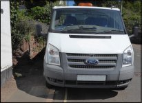 Van parked on pavement in village street TZ70 P1030814.JPG Van parked on pavement in village street TZ70 P1030814.JPG