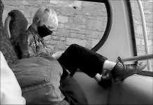 Feet on the fascia Exeter TZ70 P1030856 (8) Mono crop.JPG