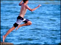 Boy leaping off groine at Sidmouth G9 P1014230.JPG Boy leaping off groine at Sidmouth G9 P1014230.JPG