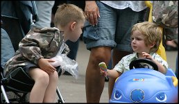 Sharing a lollipop at Swindon Mela CAN_4231.JPG Sharing a lollipop at Swindon Mela CAN_4231.JPG
