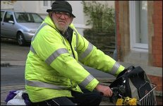 Older man yellow Jacket on motor bike 10D CAN_5619.jpg Older man yellow Jacket on motor bike 10D CAN_5619.jpg