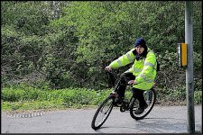 Cyclist crossing at lights Swindon 1Ds II CL7725.jpg