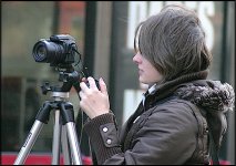 Young woman with camera on tripod Northampton CAN_5606.jpg Young woman with camera on tripod Northampton CAN_5606.jpg