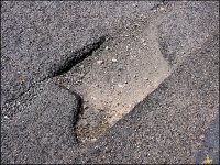 Deterorating trench across road FZ82 P1010539.jpeg