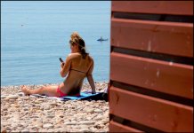 Sunbathing young woman at Budleigh Salterton IMG_0005.JPG Sunbathing young woman at Budleigh Salterton IMG_0005.JPG